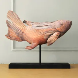 Swimming koi statue